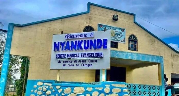 A rural health center in Ituri with armed militia members and medical staff
