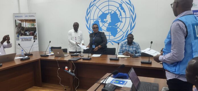 Réunion de présentation du rapport CCDD à Kinshasa avec graphiques financiers