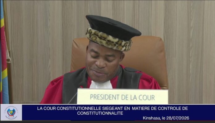 Constitutional Court judges reviewing referendum law document