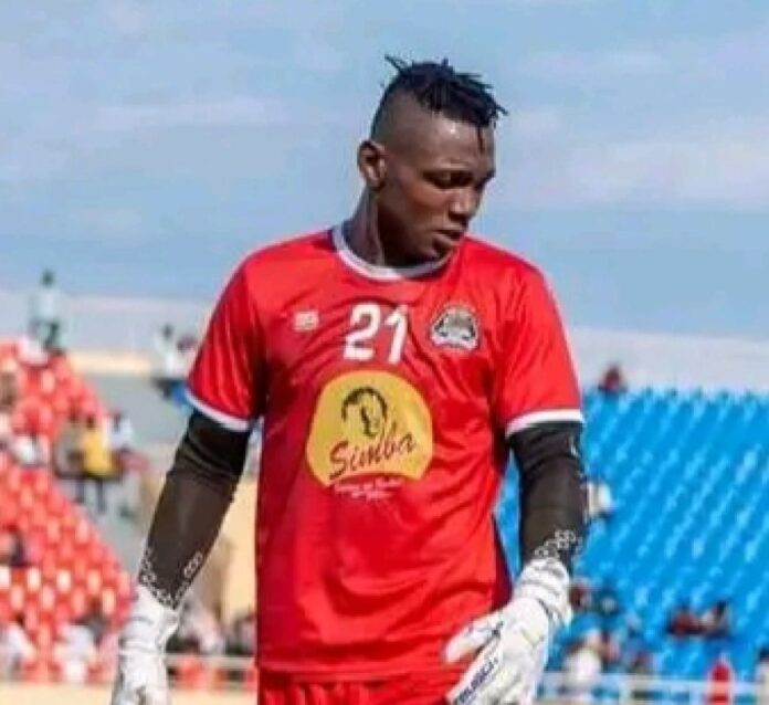 Gardien de but congolais plongeant pour arrêter un ballon