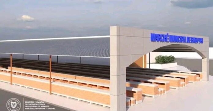 Site dégagé de la place UPN à Ngaliema après la démolition des constructions anarchiques, avec des engins de chantier