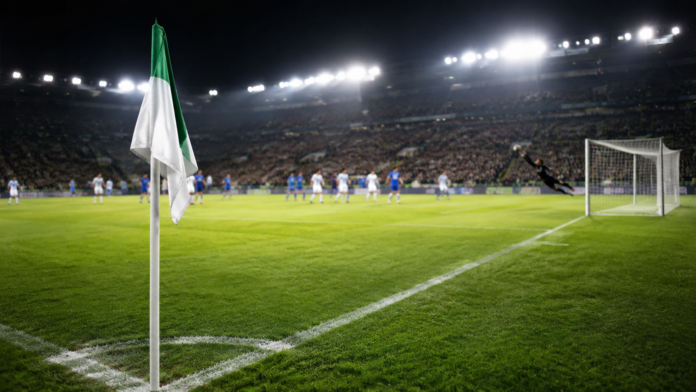 Stade de football éclairé après un match tendu