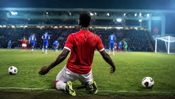 Terrain de football anglais sous les projecteurs