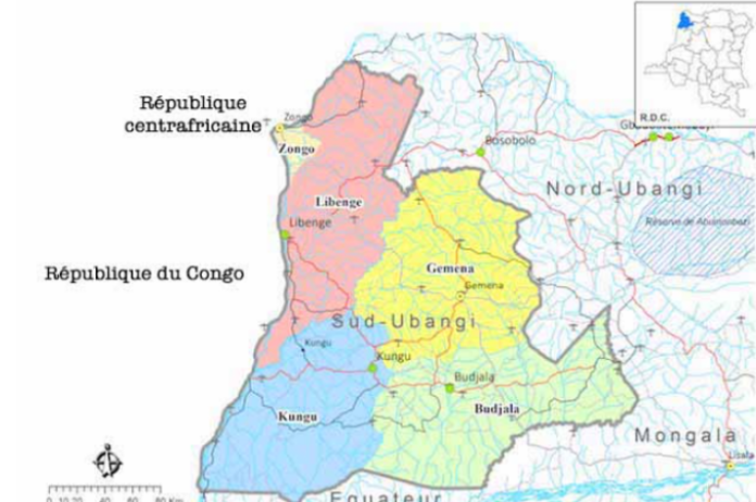 Engins de terrassement sur la route nationale 6 dans la province du Sud-Ubangi, entourés de végétation, marquant le début des travaux